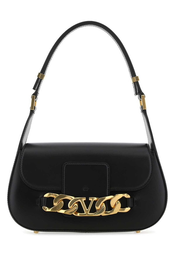 Valentino Garavani Tracolla Exterior: 100% Calf. Lining: 100% Nappa leather. Finishing: Antiqued golden metal shoulder bag in black