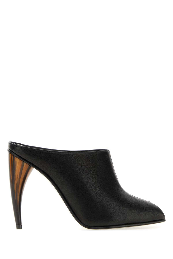 Alexander McQueen Exterior: 100% Lamb Interior: 100% Leather Sole: Leather and Rubber mule in black
