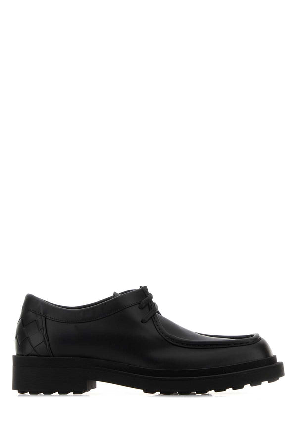 Bottega Veneta Exterior: 100% Calf; Interior: 100% Leather; Sole: Rubber lace-up flat in black