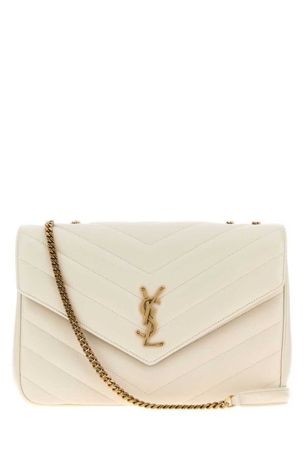 Saint Laurent Loulou Exterior: 100% Lamb Lining: 100% Fabric Finishing: Antiqued golden metal shoulder bag in beige
