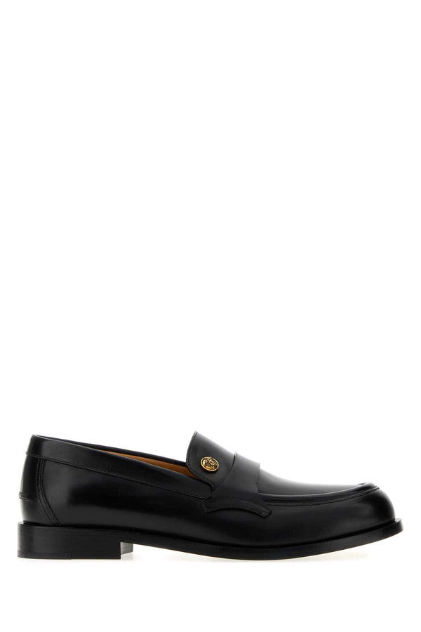 Versace Lining: 100% Goat Leather; Outside: 100% Calf Leather; Sole: 100% Calf Leather loafer in black
