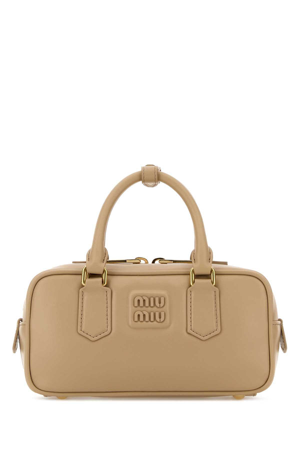 Miu Miu Exterior: 100% Leather top handle bag in beige