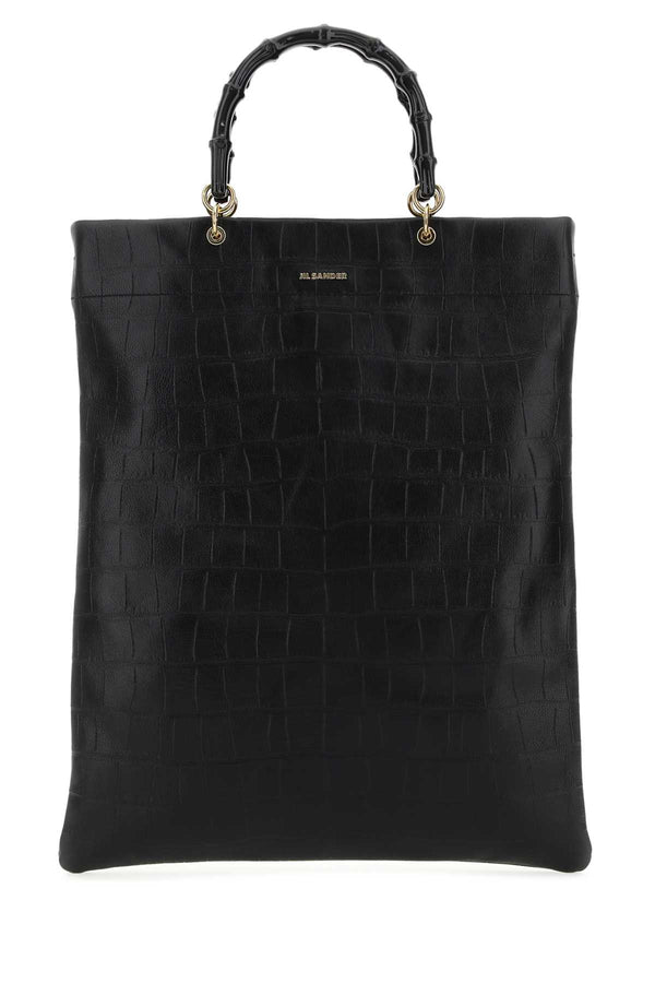 Jil Sander Exterior: 100% Leather; Finishing: Golden metal shoulder bag in black