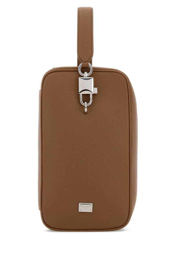 Dolce & Gabbana Exterior: 100% Calf. Lining: 100% Cotton. Finishing: Silver metal top handle bag in brown