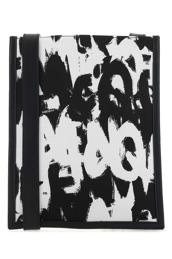 Alexander McQueen Exterior: 100% Fabric; Lining: 100% Fabric; Finishing: Enameled metal crossbody bag in black