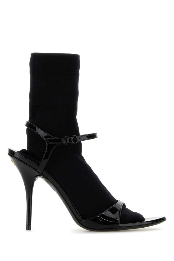 Balenciaga Exterior: Calf leather and fabric; Interior: Leather and fabric; Sole: Leather heel sandal in black