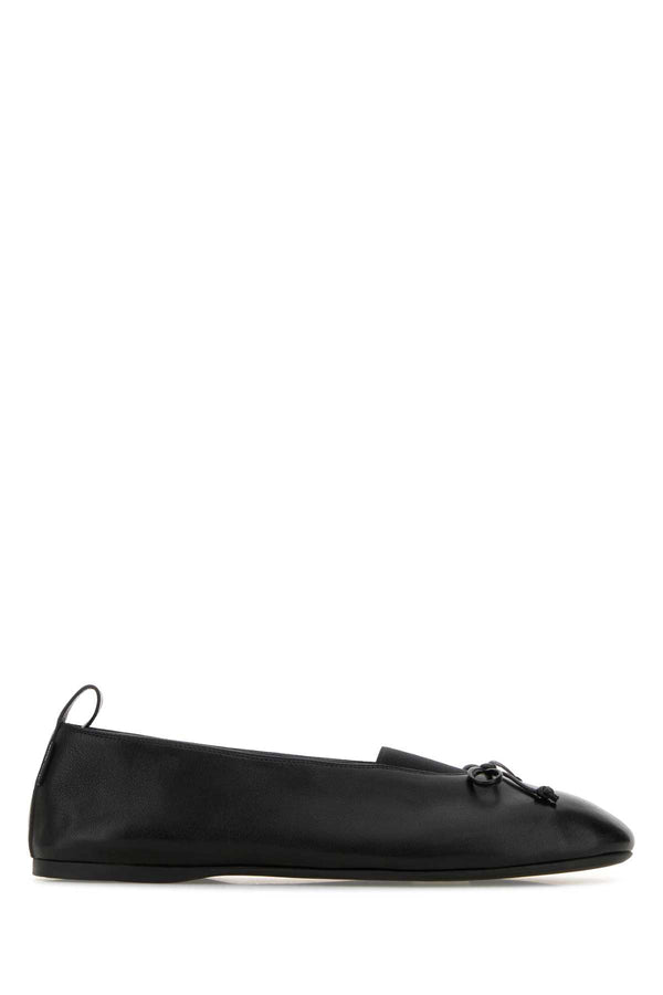 Miu Miu Exterior: 100% Nappa leather; Interior: 100% Leather; Sole: Rubber ballerina in black