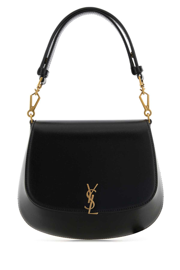 Saint Laurent Voltaire Exterior: 100% Calf Lining: 100% Leather Finishing: Antiqued golden brass shoulder bag in black