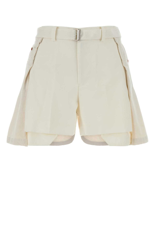 Sacai Suiting Exterior 1: 70% Polyester 30% Wool; Exterior 2: 100% Cotton bermudas in white