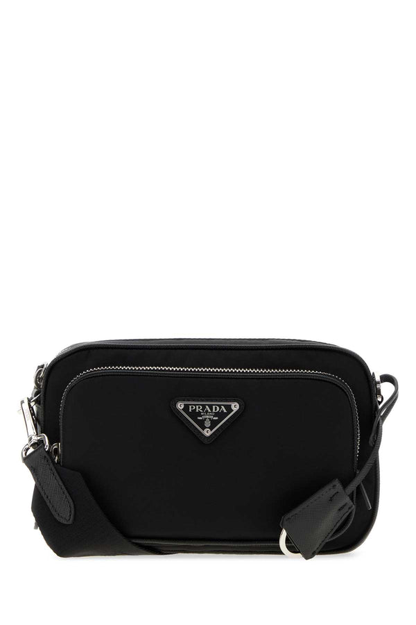 Prada Exterior: 100% Re-Nylon; Lining: 100% Fabric; Finishing: Silver metal crossbody bag in black