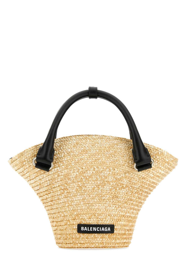 Balenciaga Exterior: 75% Straw 15% Nylon 10% Calf; Finishing: Antiqued silver metal bucket bag in beige