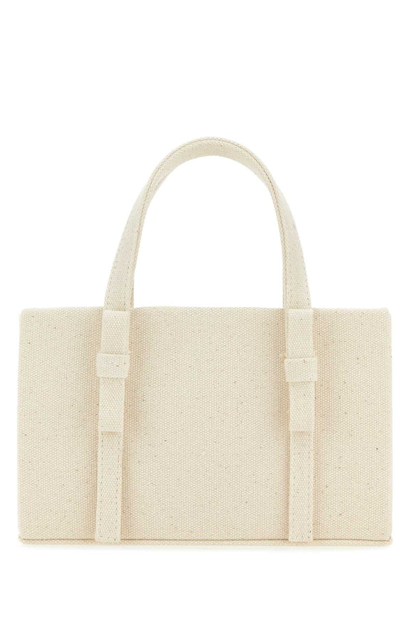 Kara Exterior: 100% Fabric; Lining: 100% Fabric; Finishing: Silver metal tote bag in beige