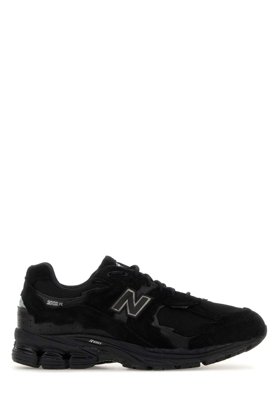 New Balance Exterior: 100% Leather 100% Fabric Interior: 100% Fabric Sole: Rubber sneaker in black