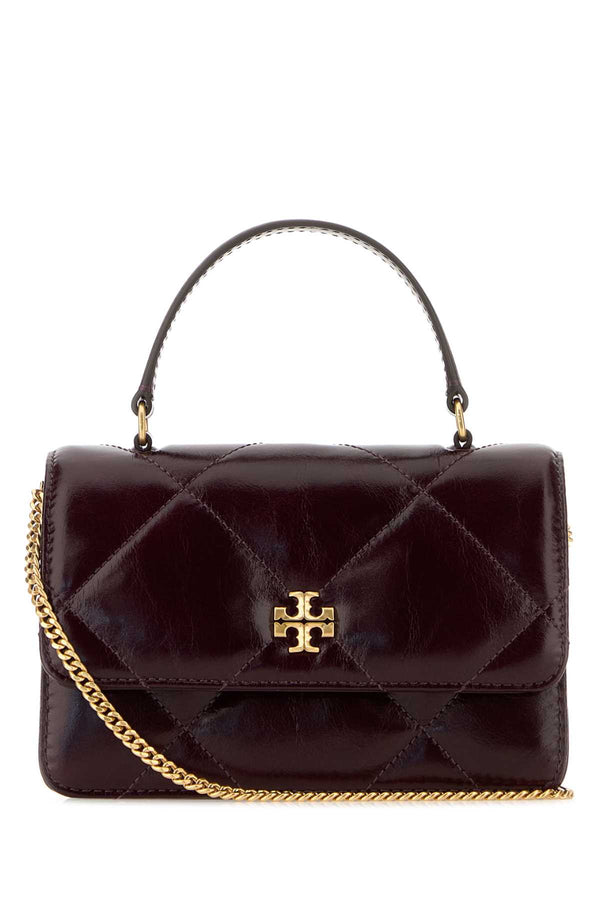 Tory Burch Diamond Exterior: 100% Leather top handle bag in burgundy