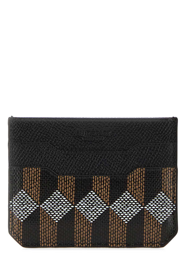 Au Depart Holder Exterior: 100% Leather card case in navy