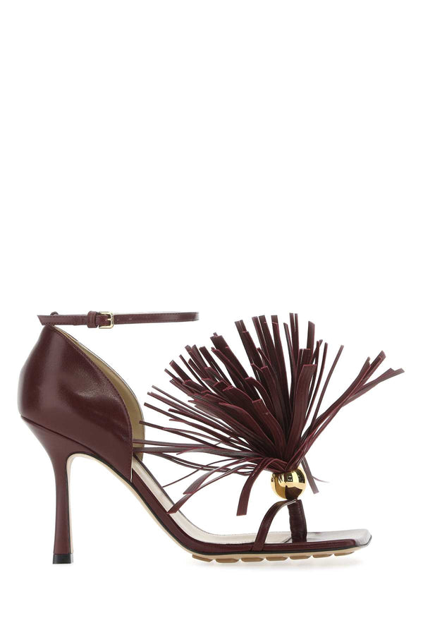 Bottega Veneta Exterior: 100% Lamb. Interior: 100% Leather. Sole: Leather and Rubber heel sandal in burgundy