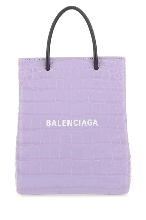 Balenciaga Exterior: 100% Calf Lining: 100% Fabric Finishing: Silver metal tote bag in purple