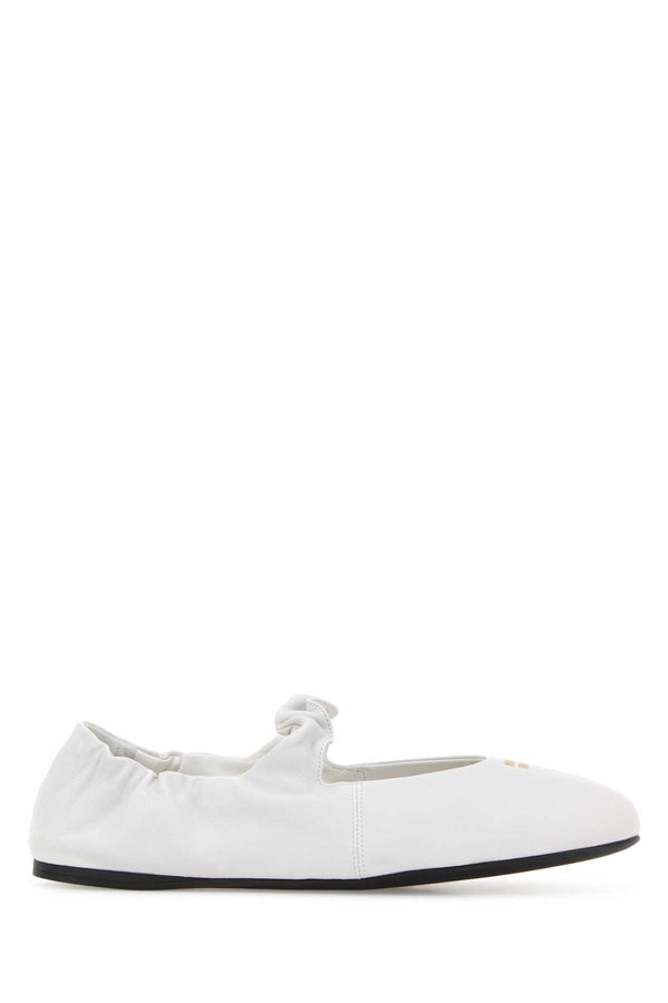 Miu Miu Exterior: 100% Nappa leather; Interior: 100% Leather; Sole: Rubber ballerina flat in white