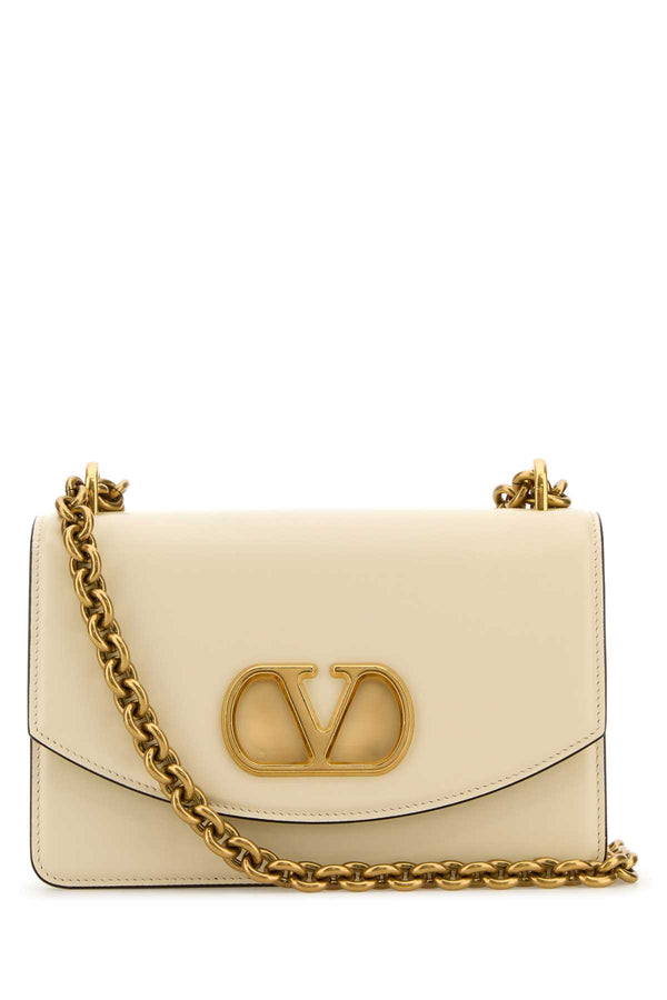 Valentino Garavani Shoulder Exterior: 100% Leather; Lining: 100% Leather; Finishing: Antiqued golden metal shoulder bag in white
