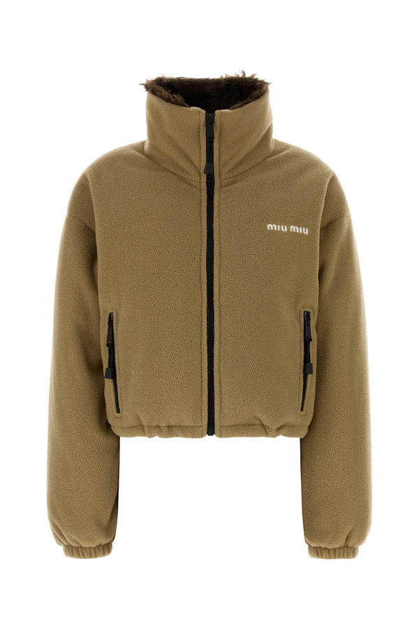 Miu Miu Exterior: 90% Recycled nylon 10% Virgin wool; Lining: 100% Recycled nylon; Padding: 90% Down 10% Feather down jacket in beige