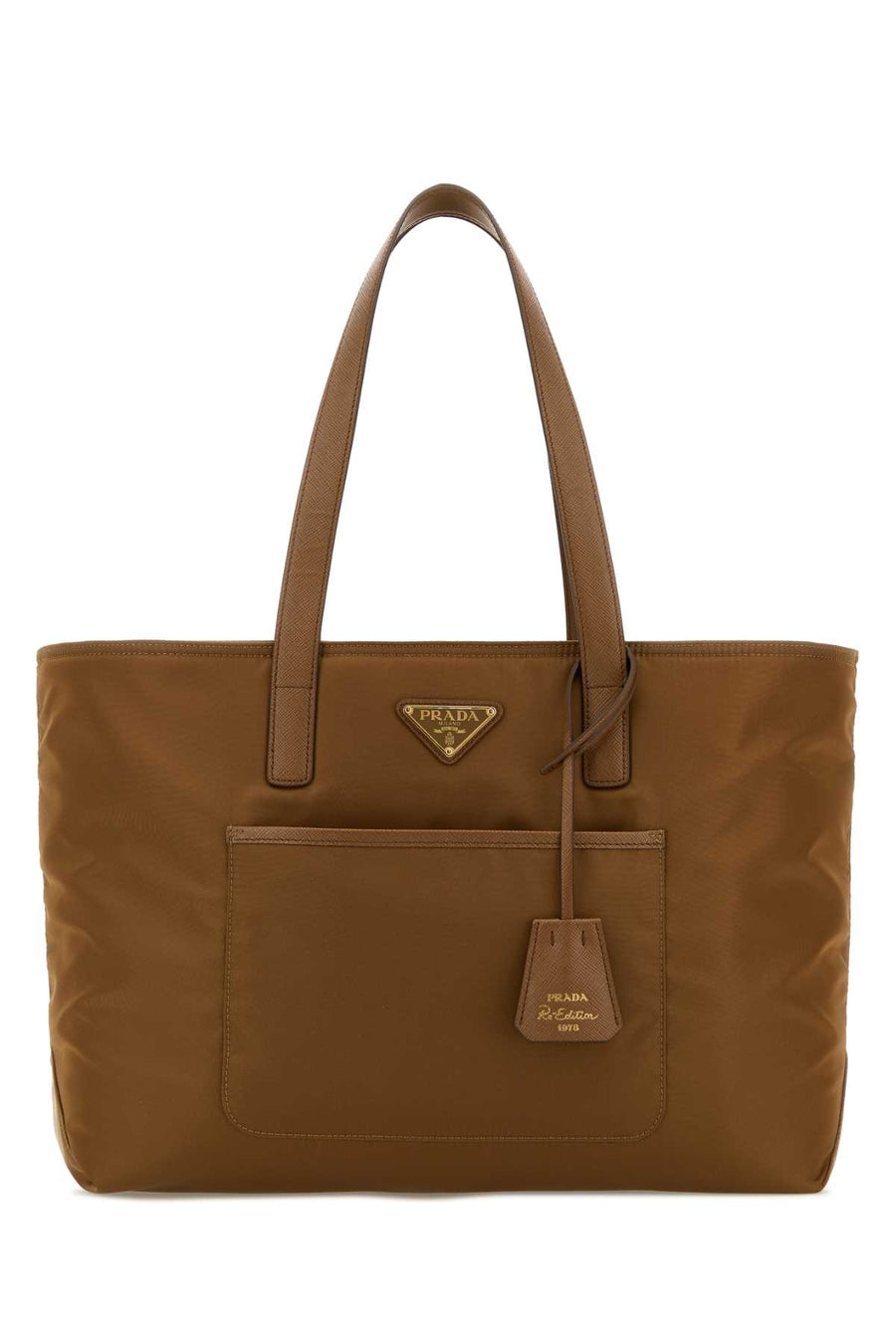 Prada Exterior: 100% Re-Nylon; Lining: 100% Re-Nylon; Hardware: Golden metal tote bag in brown