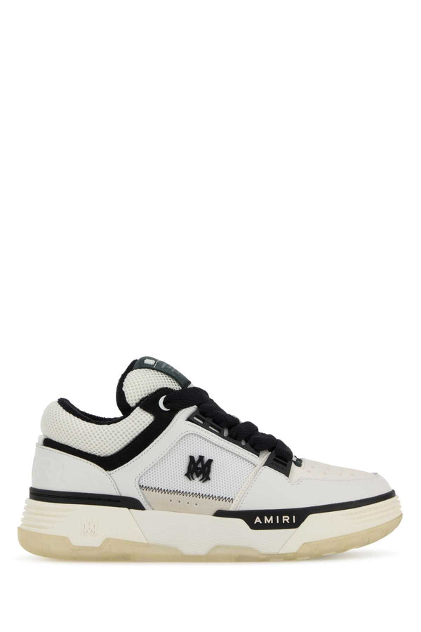 Amiri Exterior: Leather and Fabric. Interior: Fabric. Sole: Rubber sneakers in white